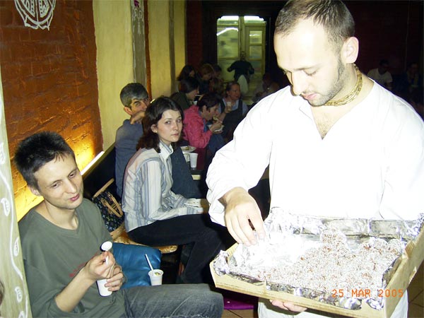 And of course prasadam in the end of program: Krishna Bhakta Prabhuis offering sweet balls to all the guests