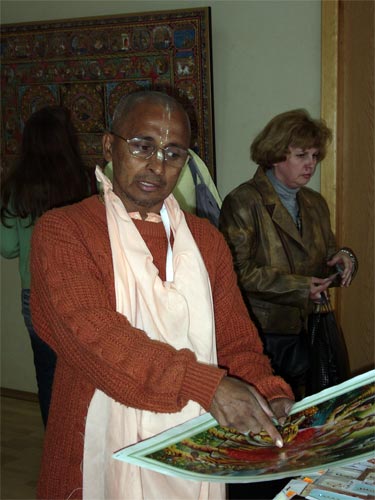 Sripad Bhagavat Maharaj is preaching to visitors, explaining the meaning of picture of Yoga-maya .